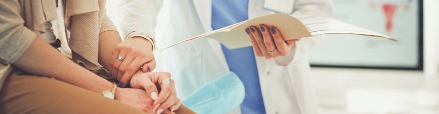 Doctor talking with a patient